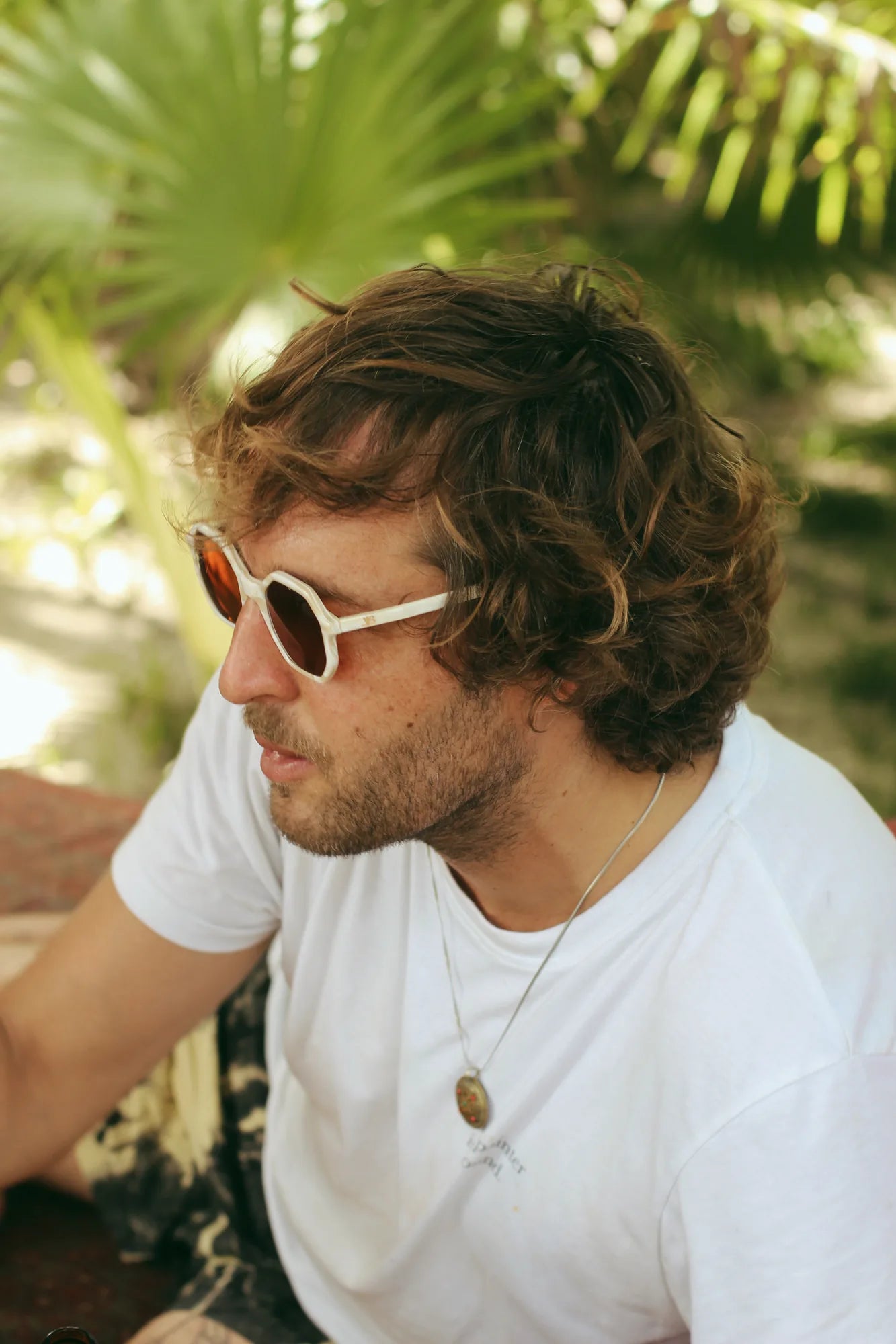 Man wearing hexagon sunglasses